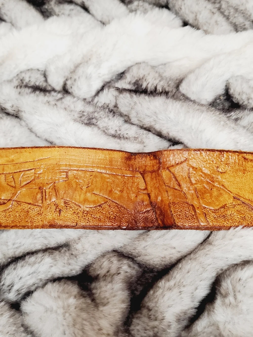 Vintage hand-tooled leather belt features a distinctive Viking Valknut symbo